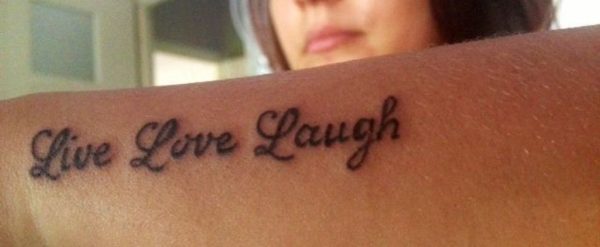 Love Laugh Tattoo On Wrist