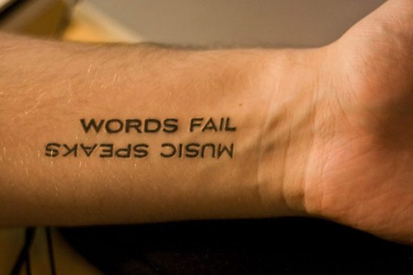 Music Speaks Quote Tattoo On Wrist