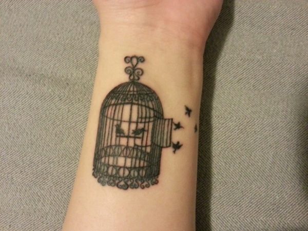 Nice Bird Cage Tattoo On Wrist