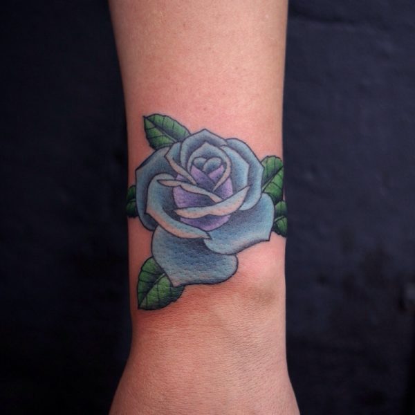 Nice Blue Rose Tattoo On Wrist