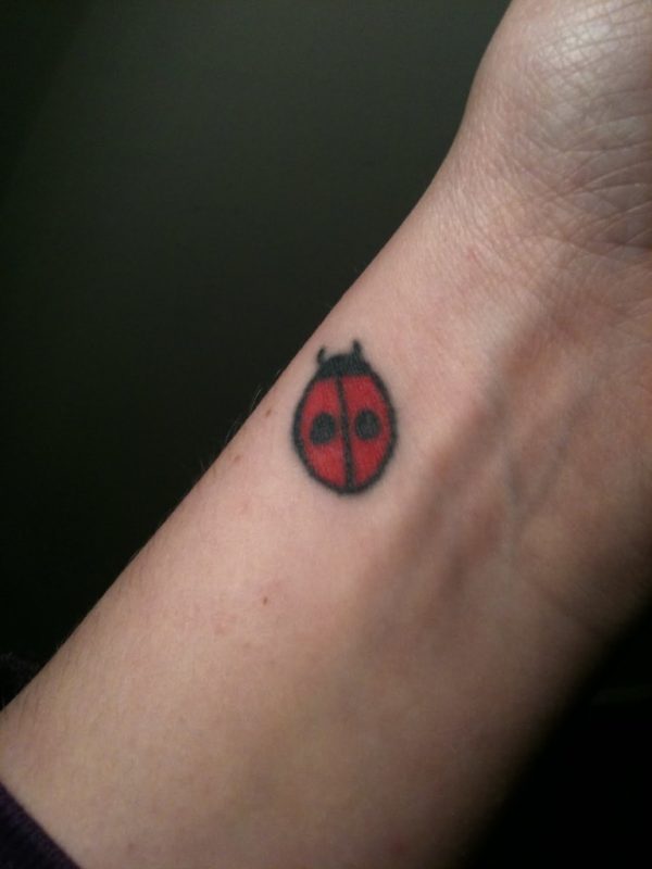 Nice Ladybug Tattoo On Wrist