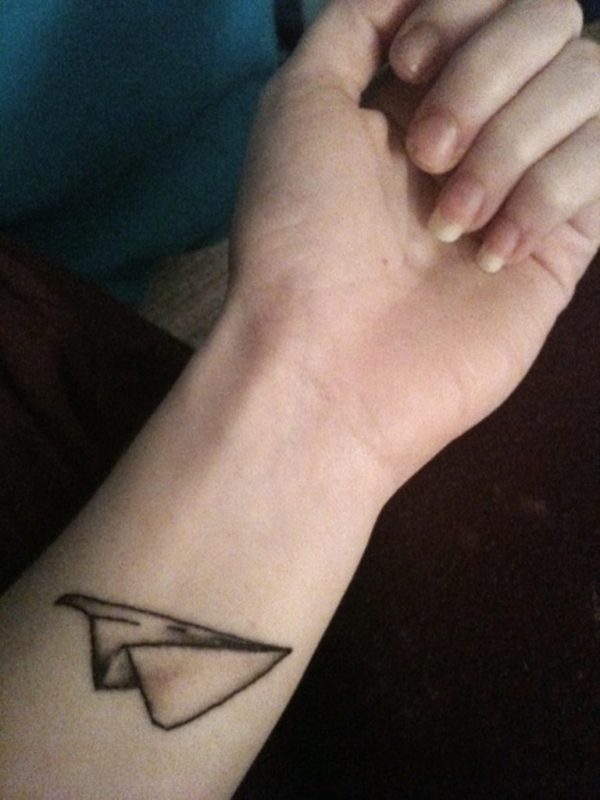 Nice Paper Plane Tattoo On Wrist