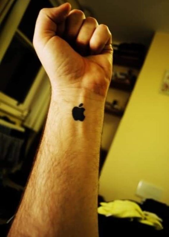 Outstanding Apple Logo Tattoo On Wrist