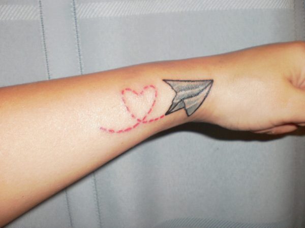 Plane Tattoo On Wrist