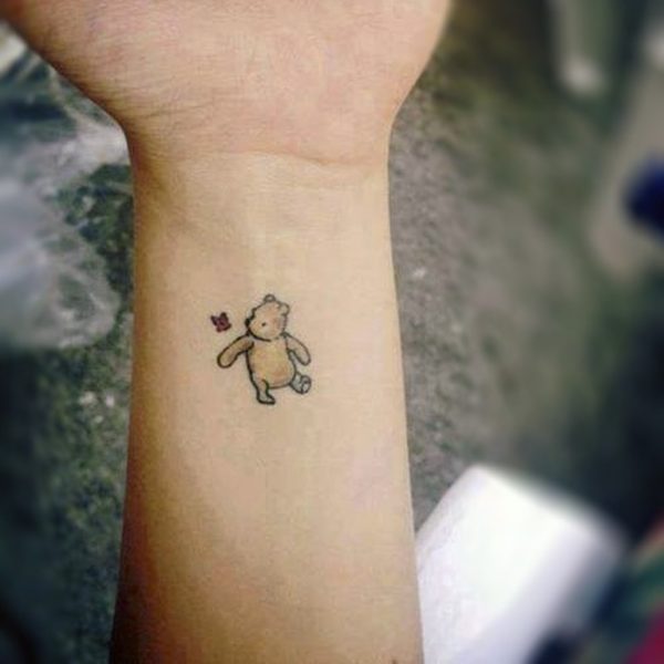 Pooh Bear Cartoon Tattoo On Wrist