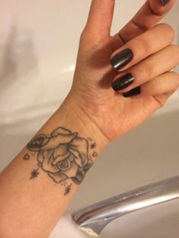 Simple Black Tattoo On Wrist