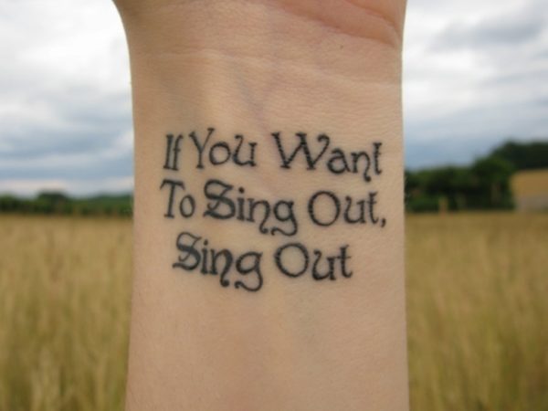 Sing Out Tattoo On Wrist