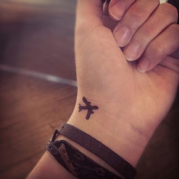 Small Aeroplane Wrist Tattoo