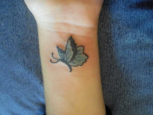 Small Colored Butterfly Tattoo On Wrist