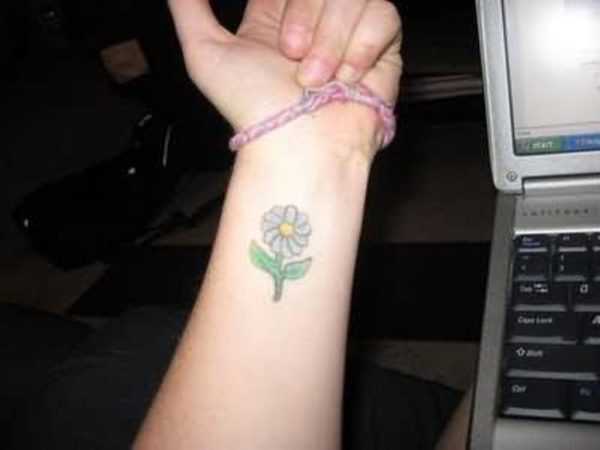 Small Daisy Flower Tattoo On Wrist
