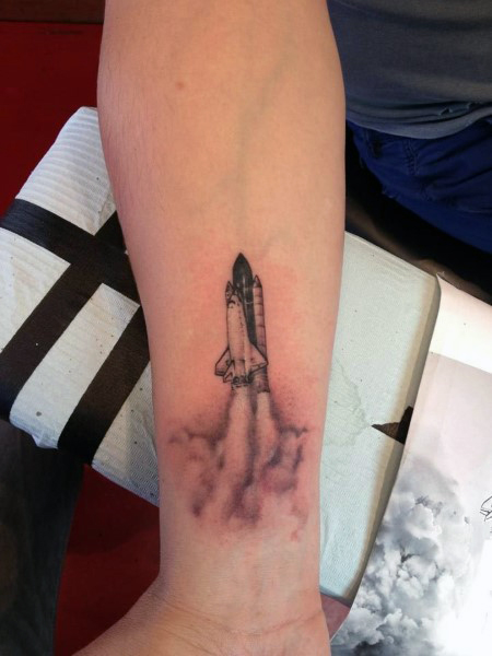 Small Rocket On Cloud Tattoo On Wrist