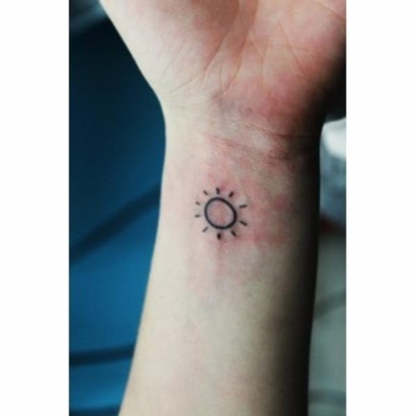 Small Sun Tattoo On Wrist