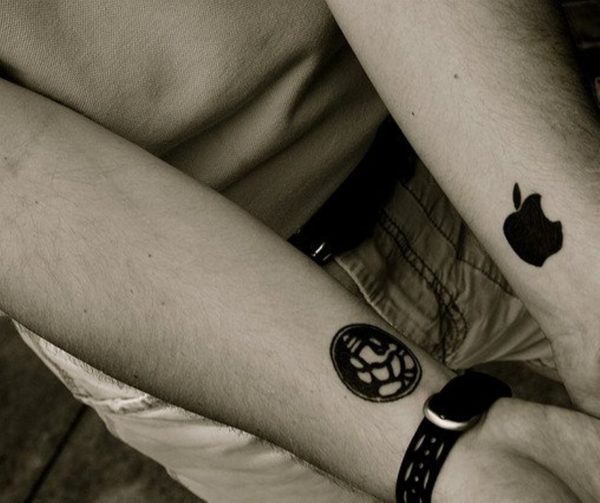 Stunning Apple Logo Tattoo On Wrist