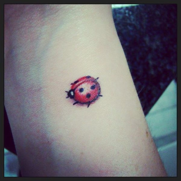 Stunning Ladybug Tattoo On Wrist