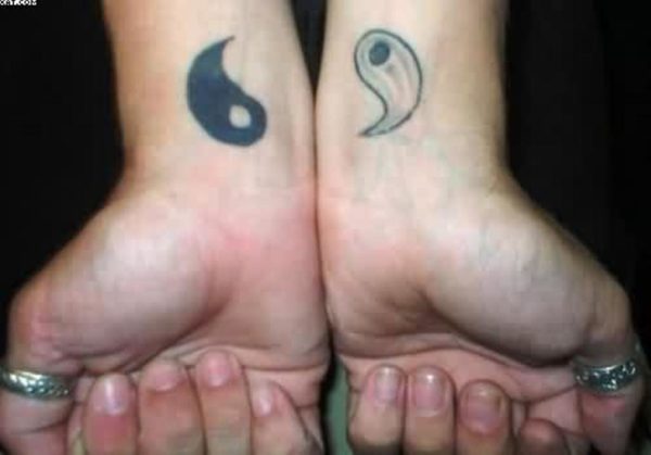 Stunning Yin Yang Tattoo On Wrist