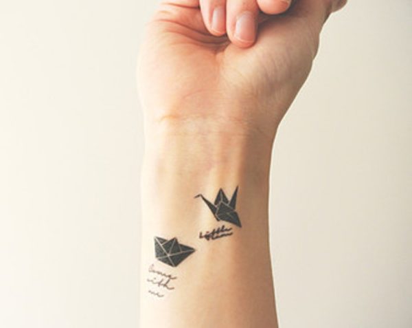 Stylish Plane Tattoo On Wrist
