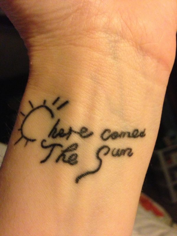 Sun Tattoo On Wrist