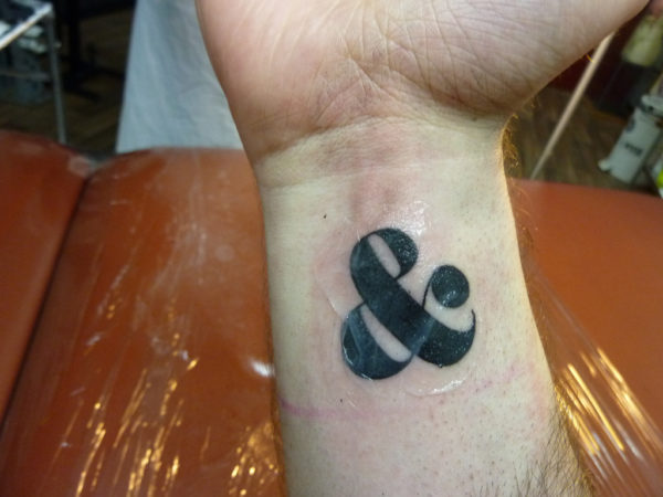Sweet Ampersand Tattoo On Wrist
