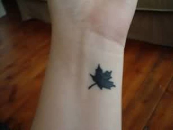 Sweet Four Leaf Tattoo On Wrist