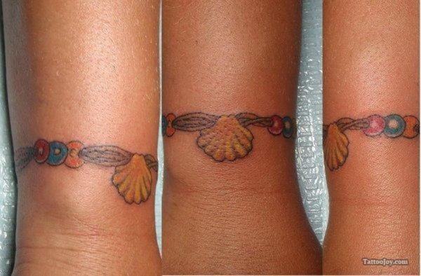 Sweet Seashell Tattoo On Wrist