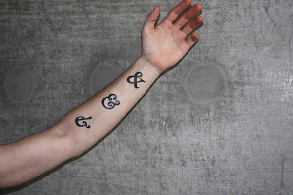 Three Ampersand Wrist Tattoo