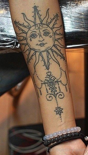 Traditional Sun Tattoo On Wrist