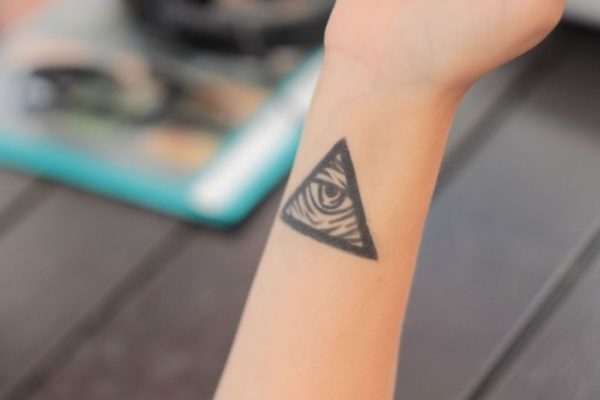 Triangle With Eye Tattoo On Wrist