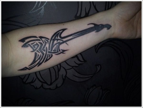 Tribal Guitar Tattoo On Wrist