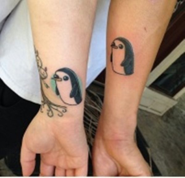 Two Penguin Tattoo On Wrist