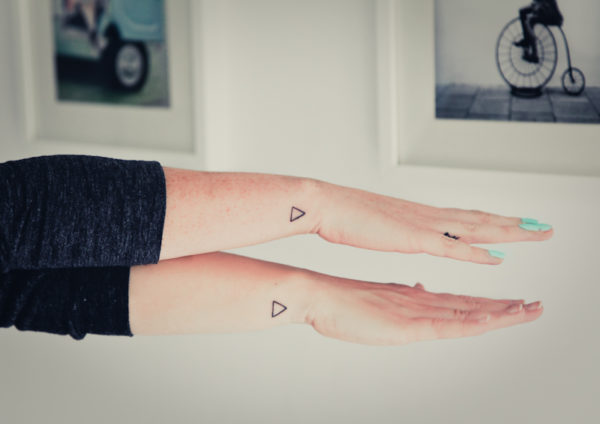 Two Tiny Triangle Tattoo On Wrist