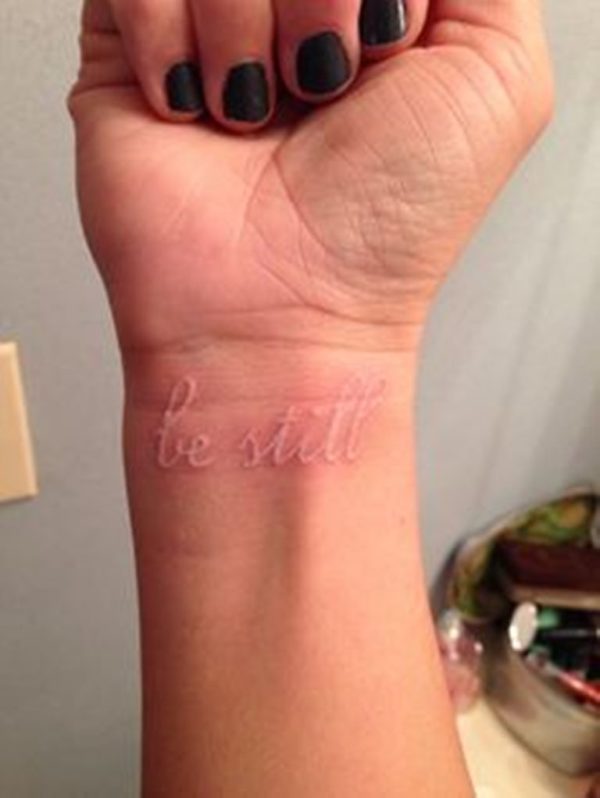 White Be Still Tattoo On Wrist