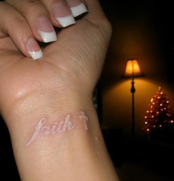  White Faith Tattoo On Wrist