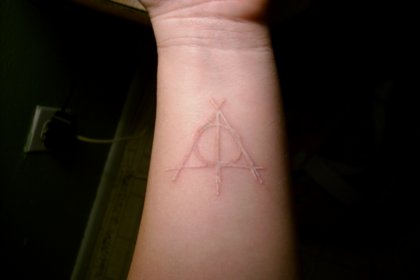 White Triangle Tattoo On Wrist