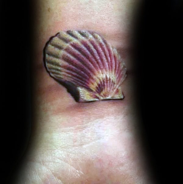 Wonderful Seashell Tattoo On Wrist