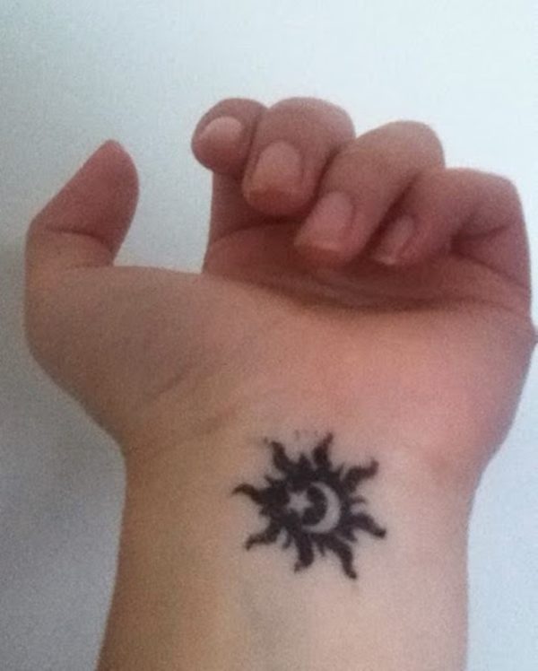 Wonderful Sun Tattoo Design On Wrist