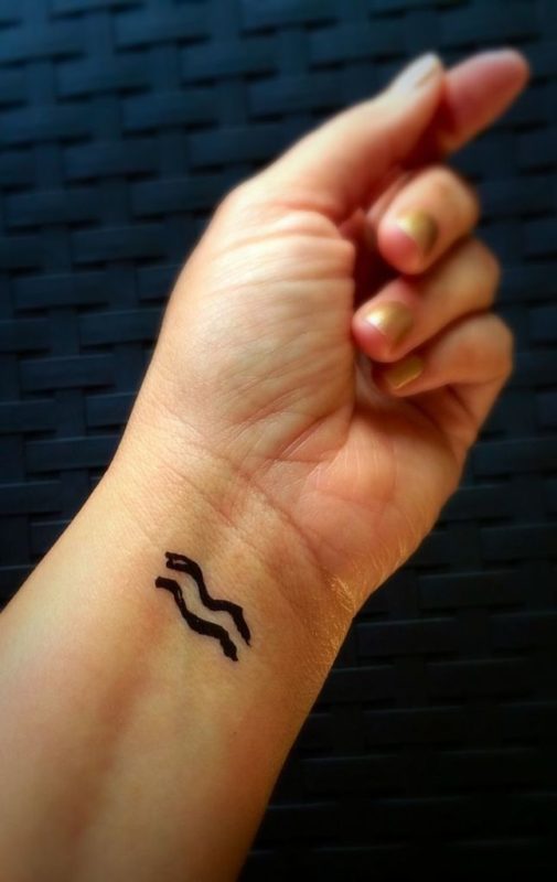 Black Aquarius Tattoo