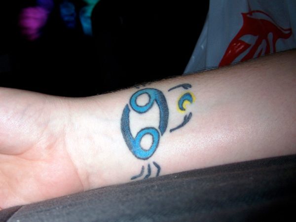 Blue Cancer Tattoo On Wrist