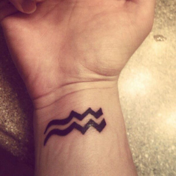 Nice Aquarius Wrist Tattoo